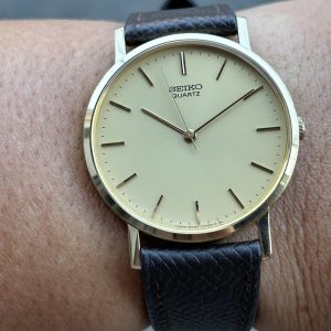 Seiko Quartz watch 2C21-0120 base metal St.Steel back / case no.444209 , made in Japan.