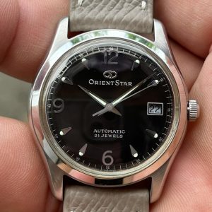 Orient Star 21 jewels Automatic 597302-70 CS , made in Japan .