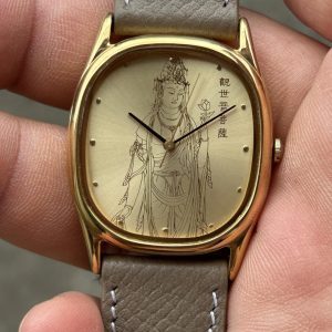 觀世晉菩薩 - quartz watch , made in Japan.