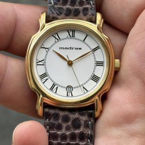 Madras quartz watch stainless steel back, made in Japan.