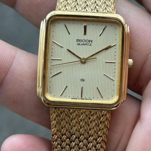 Vintage Ricoh Quartz watch/ case no.505501 , made in Japan.