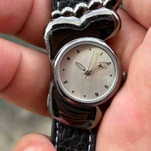 Naison's Quartz watch GV1569 stainless Steel back, made in Japan.