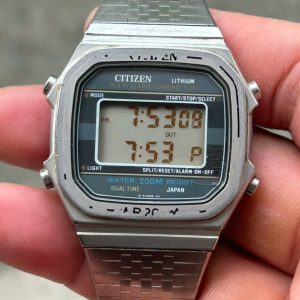 Citizen Multi Alarm Dual Time Digital Water 200M Resist 100 P100-311493 TA/ case no.6020453, made in japan.