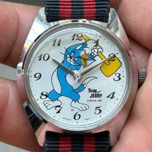 Vintage Seiko Tomony 5000-7000 MGM Tom and Jerry manual winding watch, made in Japan.