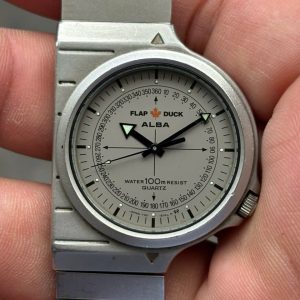 Seiko Alba Quartz Watch "Flap Duck" Giugiaro-Style 36mm Y101-6040/ case no.343591, made in Japan.