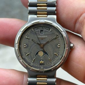 Vintage Longines Conquest Moon Phase Quartz watch titanium, case no.22201569 , Swiss made.