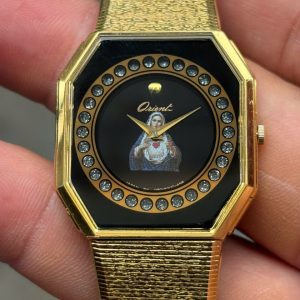 Orient Vintage quartz watch D80193U0-458 base metal bezel Stainless Steel back, made in Japan.
