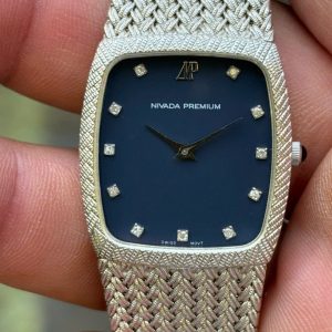 NIVADA PREMIUM QUARTZ WATCH N-91103MP PLATINUM PLATING STAINLESS STEEL BACK, Grenchen-SHITZERLAND.