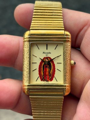 NIVADA PREMIUM QUARTZ WATCH STAINLESS STEEL BACK, case no.0240493, Grenchen-SHITZERLAND.