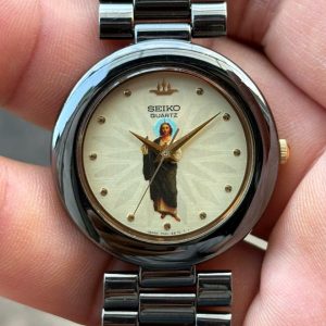Vintage Seiko Mens Quartz Watch 7N01-6E30 base metal St.Steel back , case no.1N2120, made in Japan.