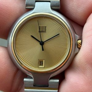 Dunhill Quartz watch, case no.6-63703, Swiss made.