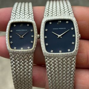 Set NIVADA PREMIUM QUARTZ WATCH N-91103MP & N-91104SP PLATINUM PLATING STAINLESS STEEL BACK, Grenchen-SHITZERLAND.
