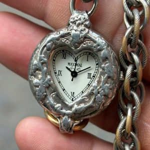 1995’s John Wind Maximal Art Quartz watch stainless Steel back, Swiss made.